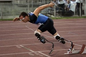 Athlete with prosthetic 'blade' legs