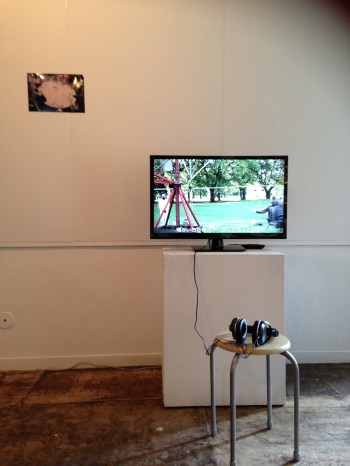 Actinium exhibition, 2014. Let Them Believe by Eva and Franco Mattes (right), Photo of James Acord's round table (left), which was re-created for the exhibition